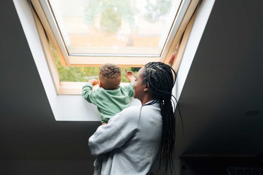 woman & child looking out window